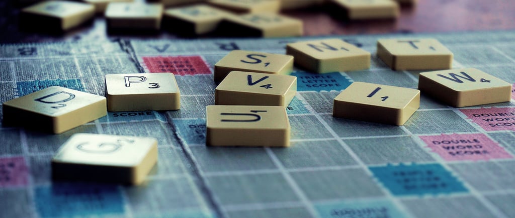 Data - Scrabble game board with several letters on it - Data - From Latin to English to French