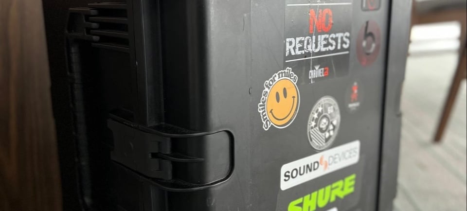 a road case with stickers on it