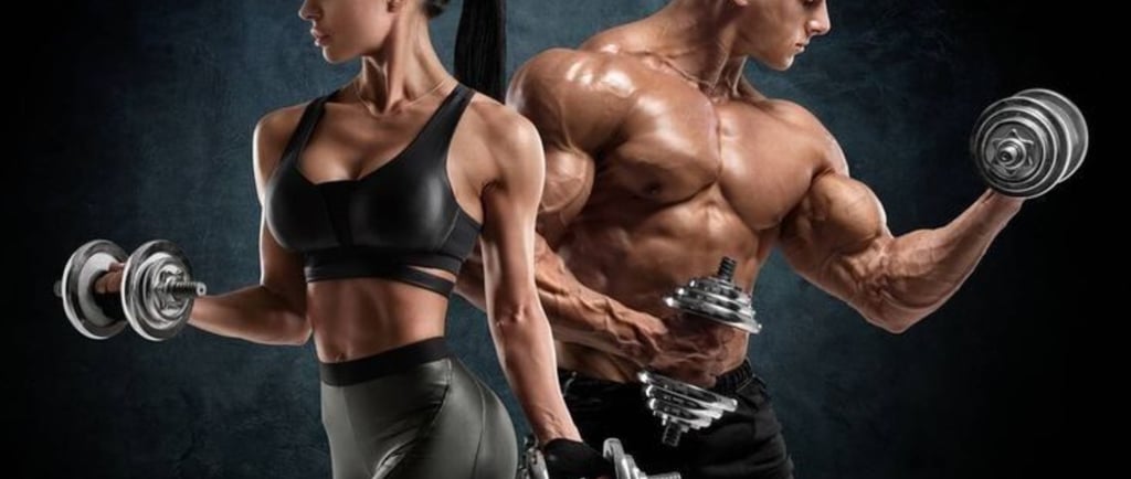A muscular man and woman performing bicep curls with silver dumbbells during a bodybuilding workout.