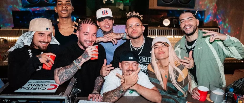 Top Colombian reggaeton artists in a recording studio
