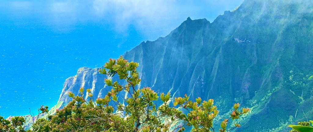 a mountain view of a mountain range with a view of the ocean