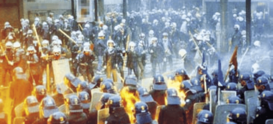 Clashes between riot police and opposition groups, 1985