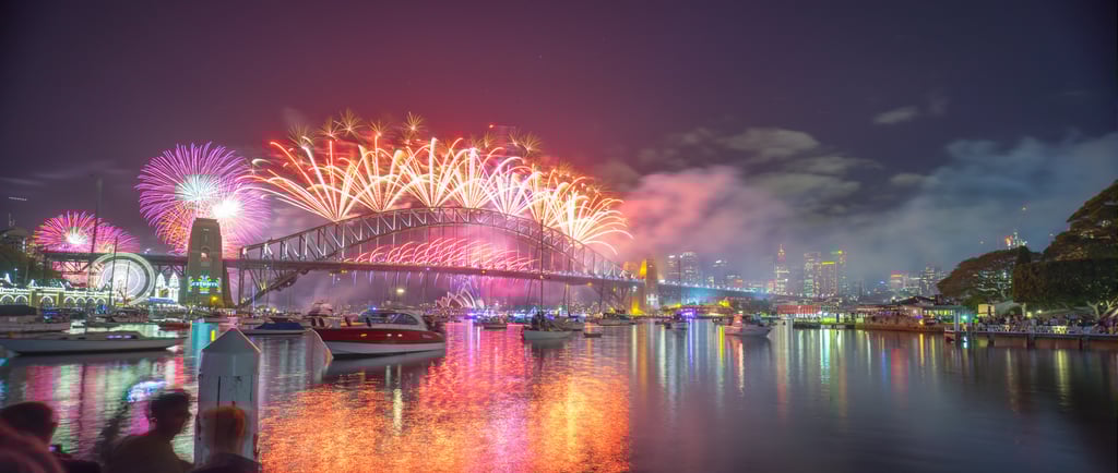 a bridge bridge with fireworks in the background