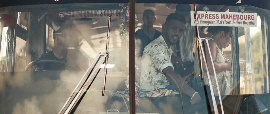 Street photography Mahebourg, passengers on the 252 Express Saiyaara bus, Mauritius