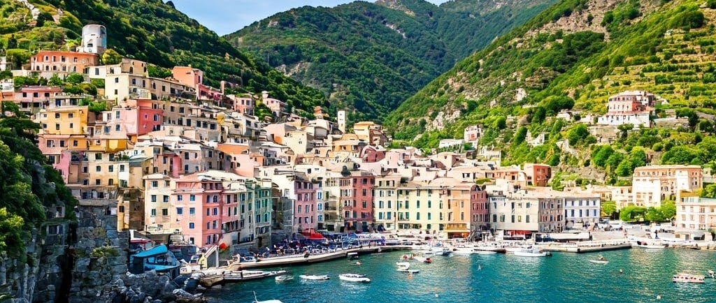 Colorful village houses of Cinque Terre perched on cliffside overlooking the Mediterranean Sea