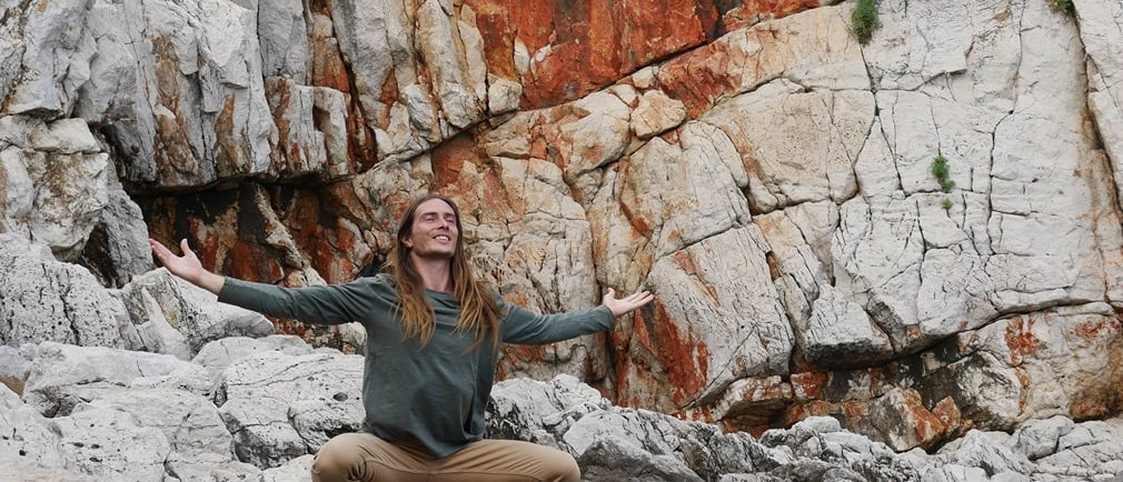 Dr. Keith Motes practicing Shaking Medicine for trauma release in nature.