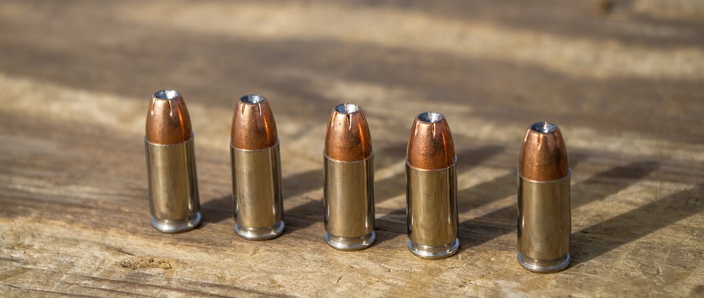 9mm ammo on a table displayed