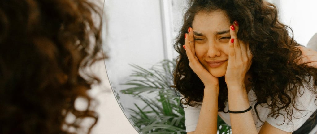Photo by Polina Zimmerman: https://www.pexels.com/photo/upset-woman-looking-in-mirror-3958779/