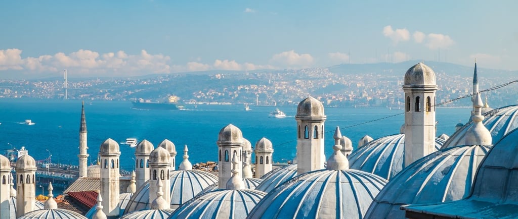 an image of mosques and churches overlooking the sea in Istanbul, Turkey
