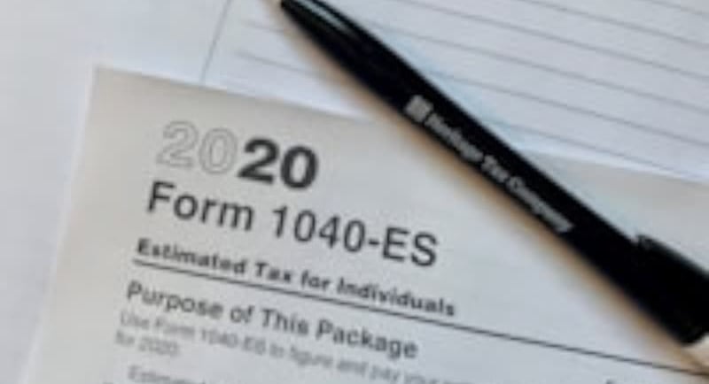 Tax return document on desk, key for small business due diligence and financial review.