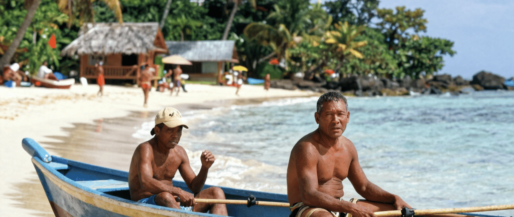 a man riding a skateboard down the side of a ramp