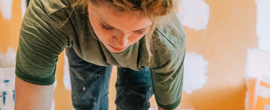 Woman working hard preparing her Highlands Ranch home for sale