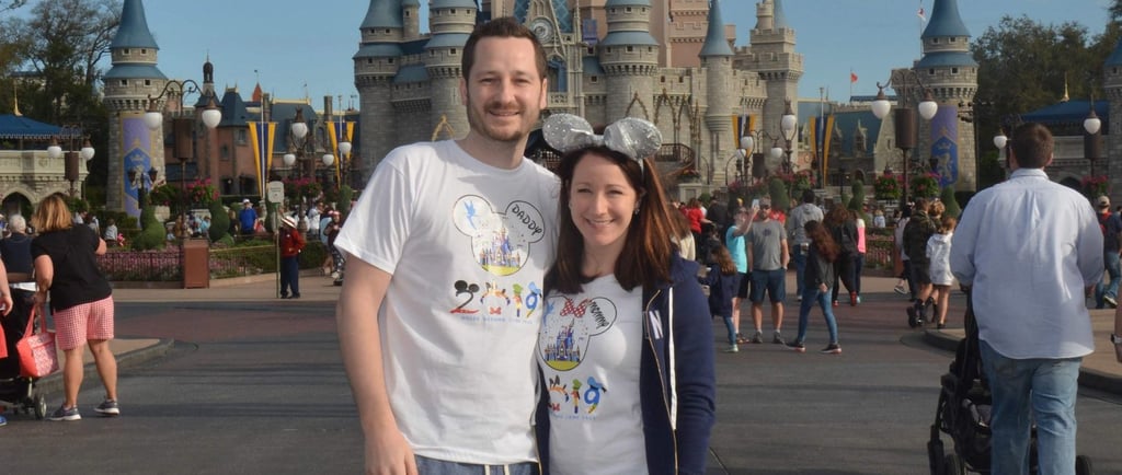 Couple standing in front of Cinderella's Castle at Walt Disney World