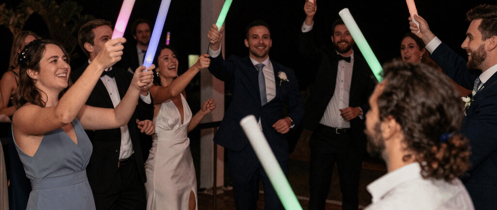Outdoor table set for a banquet with food and decorations