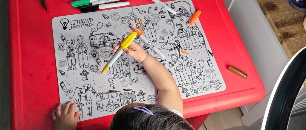 Preschooler exploring animals on Scribbly Kids Adventure Safari reusable drawing mat