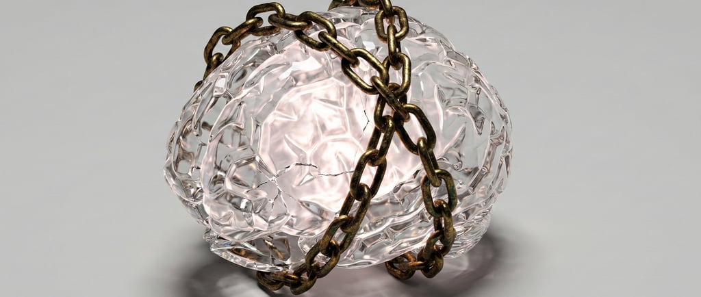 A glass human brain cover with chains