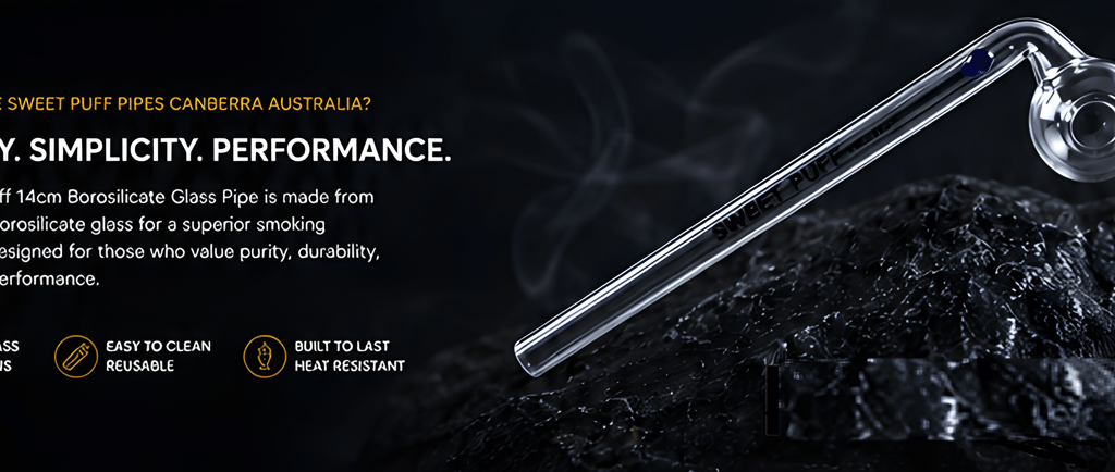 Sweet Puff 14cm borosilicate glass pipe on dark rock with smoke and product feature text.