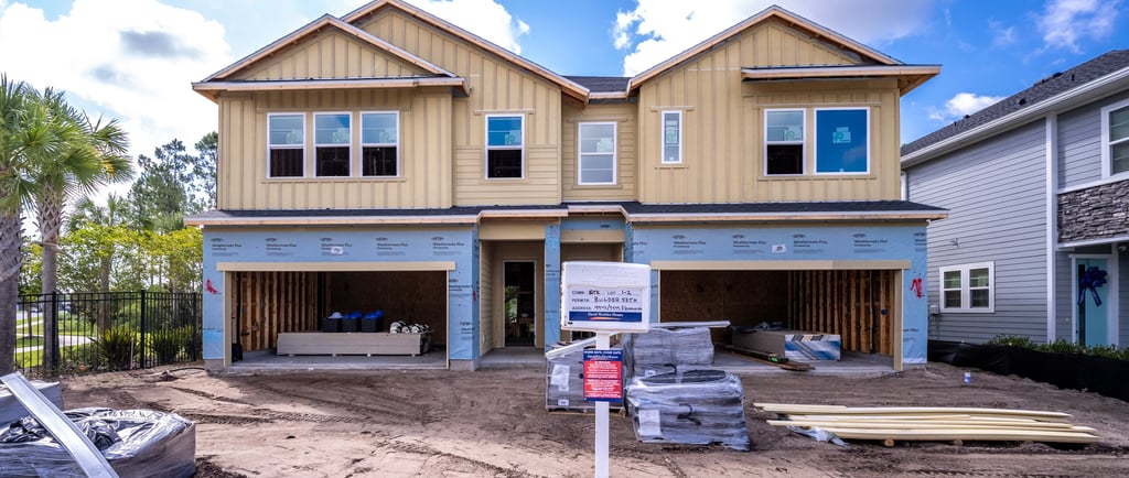 New construction two-story home being built in Jacksonville, Florida, featuring modern coastal-style