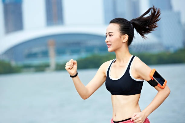 girl with ponytail jogging