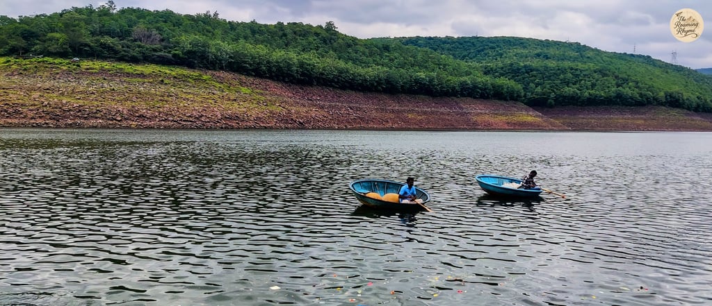 Fishermen in coracles over the Krishna River - captured from Pathalganga.