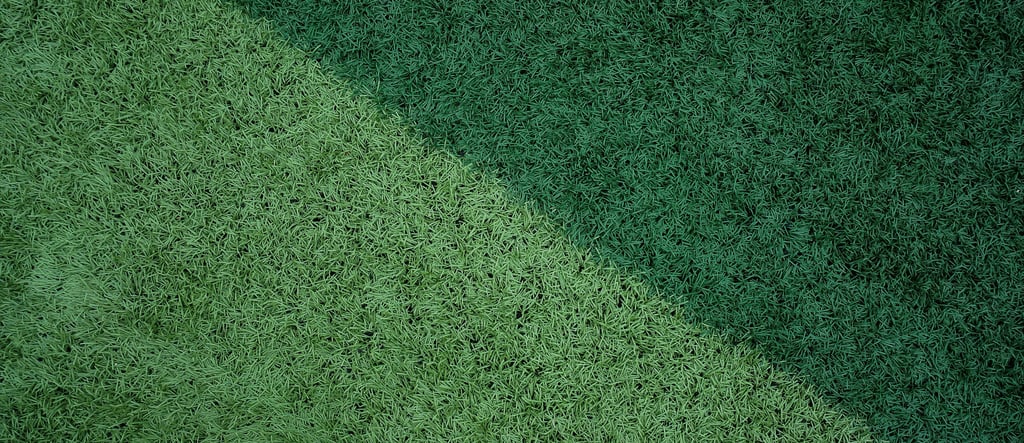 Durable dual-tone synthetic turf carpet with light and dark green artificial grass blades.