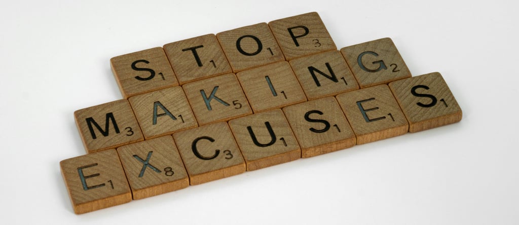a wooden block with words that spell out the word stop making excuses
