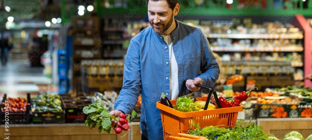 Man shops organic Iranian vegetables, fresh produce in basket, healthy eating from trusted food brands
