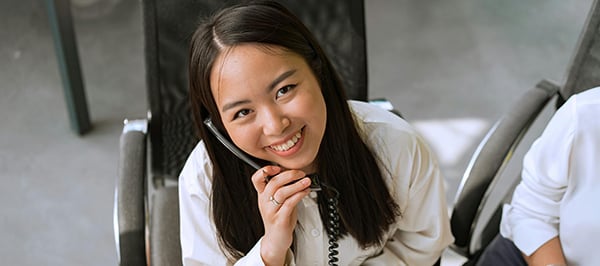 Female travel advisor on phone