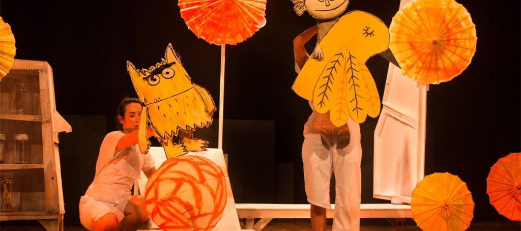 a woman in a yellow dress and a man in a white shirt