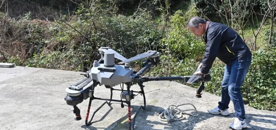 drone delivering food to farmers in the field
