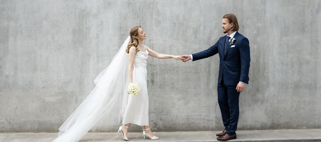 a bride and groom holding hands 