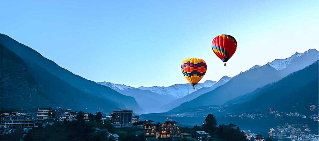 a two of hot air balloons in the mountains in Manali