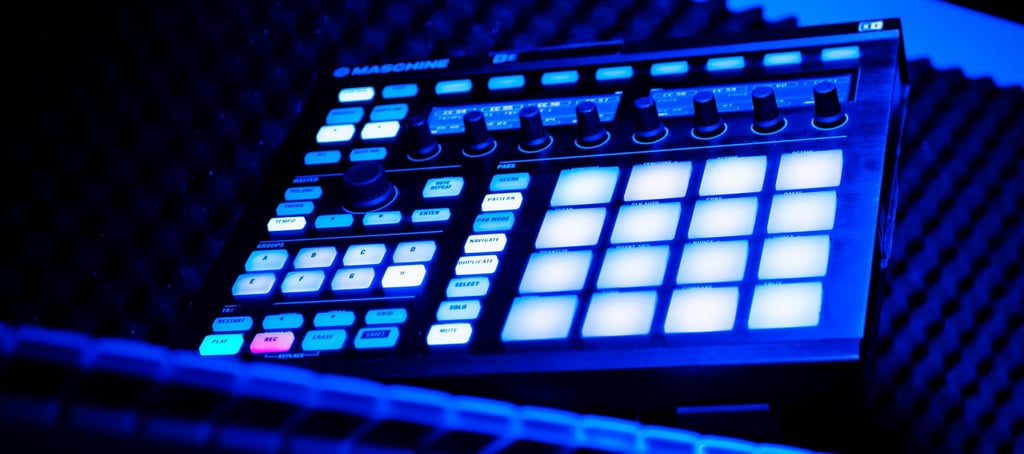 a dj controller controller and a keyboard in a recording studio