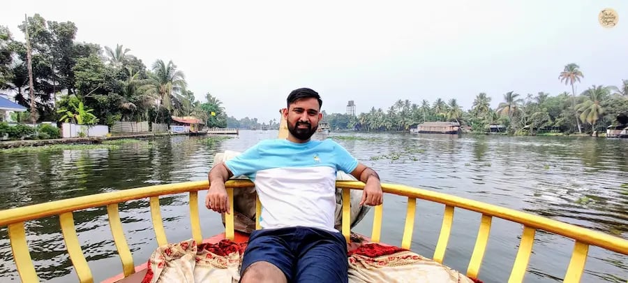 Houseboat journey through the scenic Kuttanad paddy fields and Alleppey backwaters, known as Kerala’s Rice Bowl.