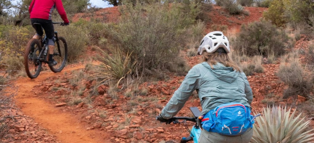 woman riding her bike in the mountain mtb enduro