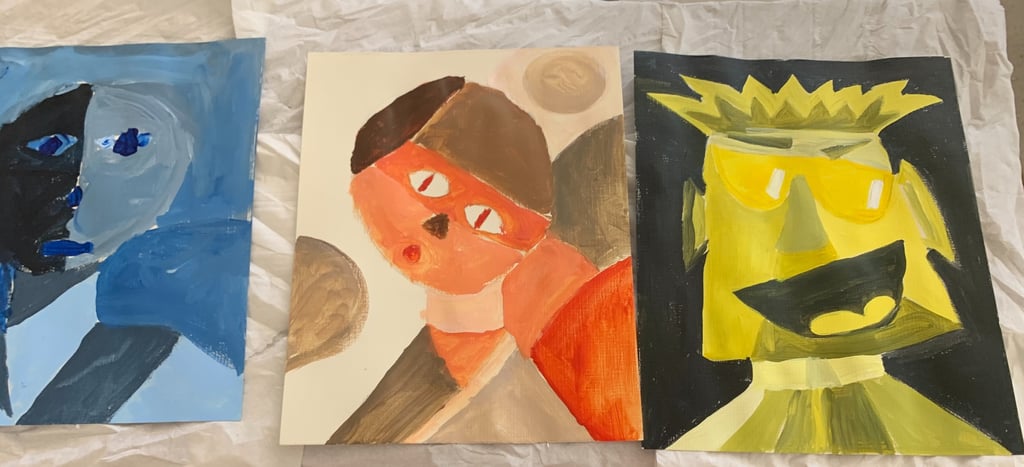 paintings of abstract human faces with varying color tones