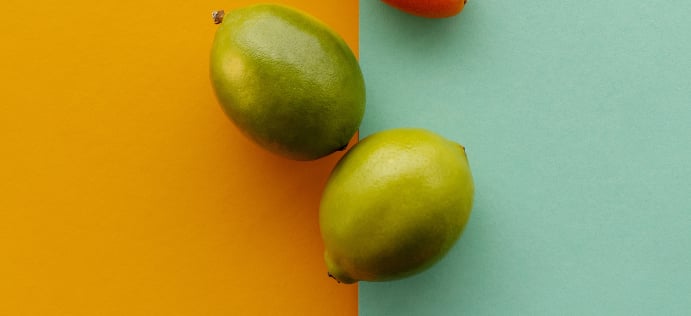 a variety of fruits and vegetables on a colorful background