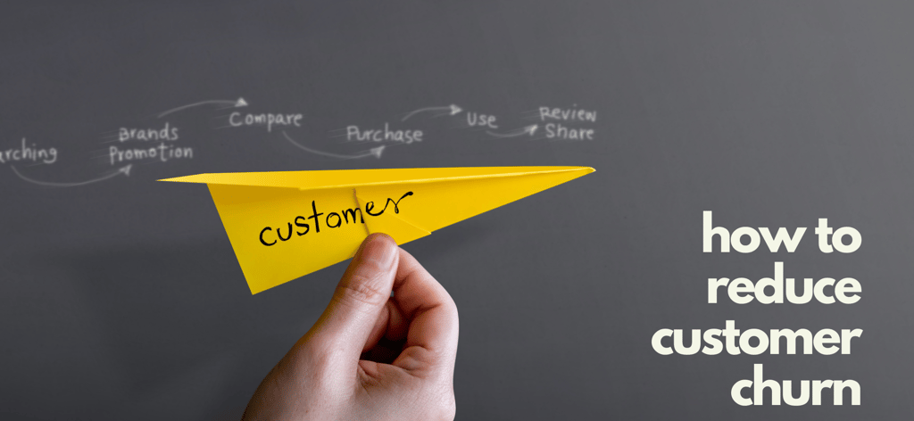 Chalkboard showing a churn reduction playbook with the caption of how to reduce customer churn.