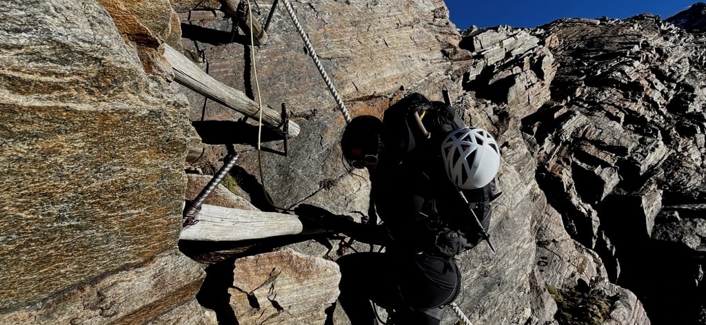 mais alhajri climbing a rocket mountain using a via ferrata route