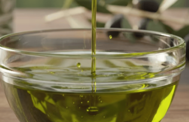 Oliabo extra virgin olive oil poured in glass jar