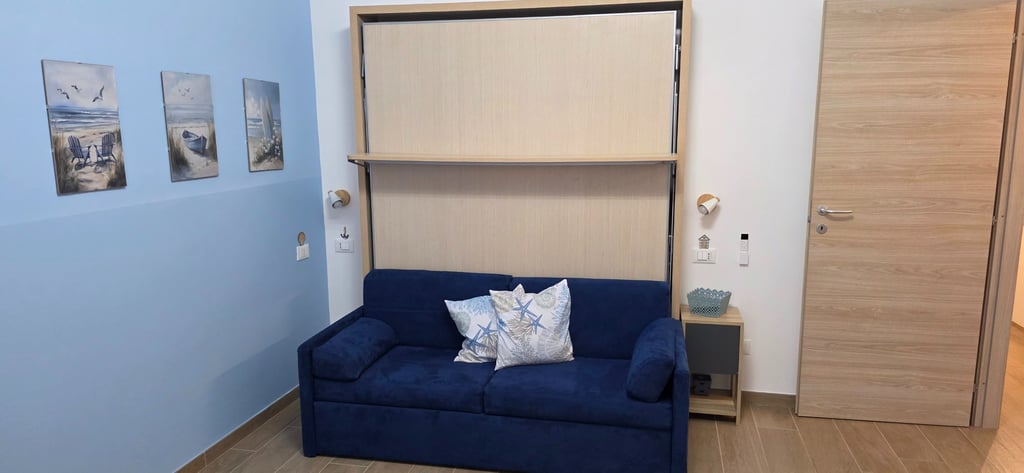 Letto a scomparsa con divano
