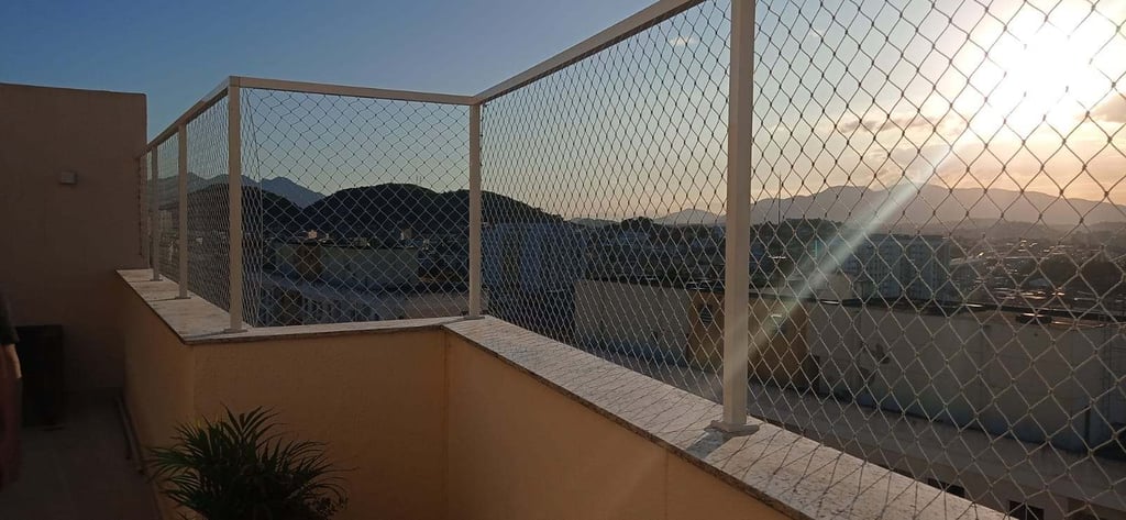 rede de proteção instalada em cobertura de edificio