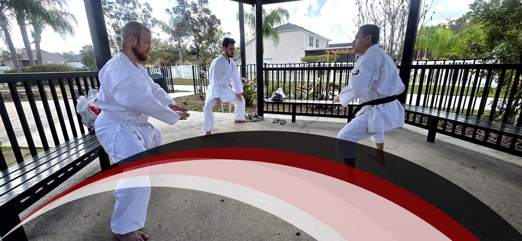 Children and adults training karate in disciplined martial arts environment