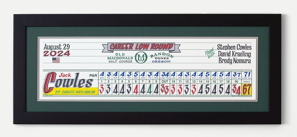A framed piece of scorecard artwork for Jack Cowles who shot his career low round at Bandon Dunes.