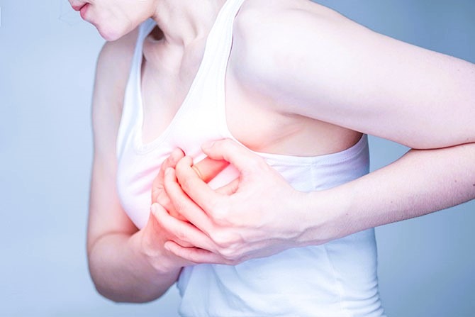 woman facing Breast pain
