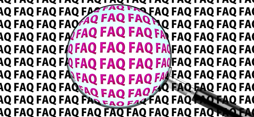 Ein Bild mit einer Lupe für die am häufigsten gestellten Fragen