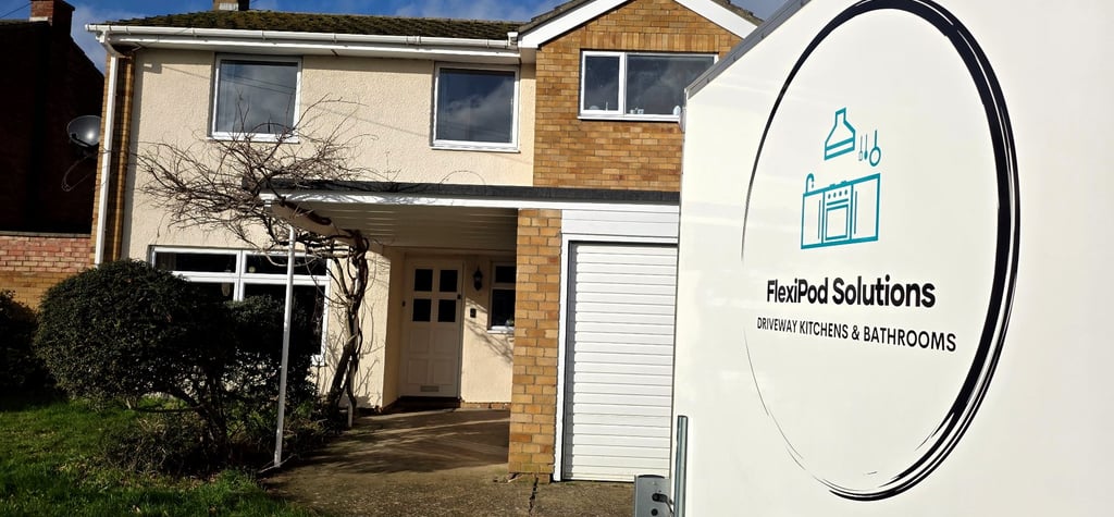 Temporary kitchen pod installed on a residential driveway during a home renovation.