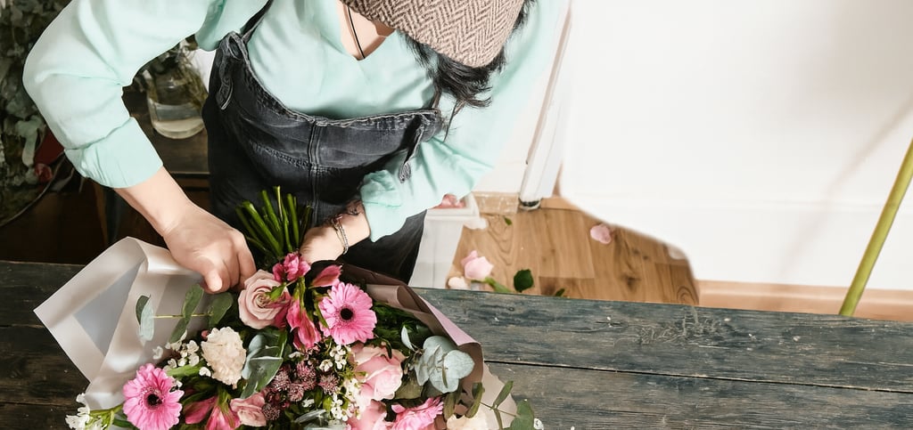 Warehouse staff sorting and packaging dried flowers for wholesale orders