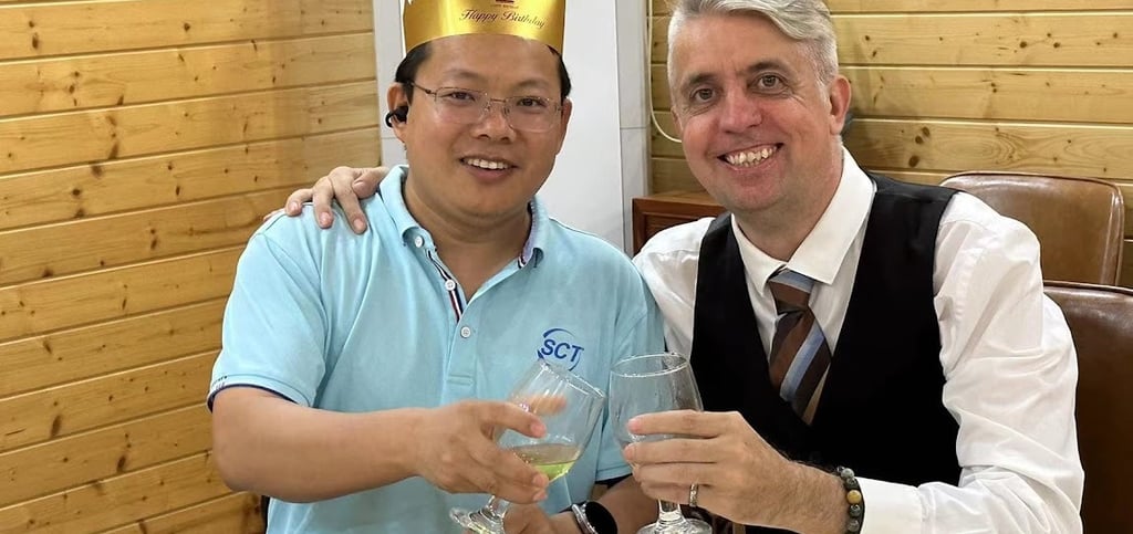 a man and woman are sitting at a table