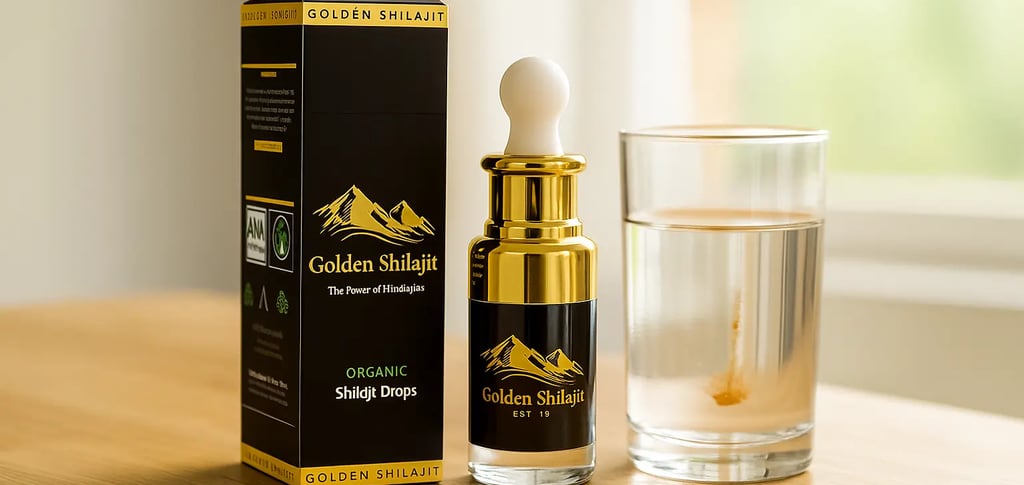 a glass of water with golden shilajit drops